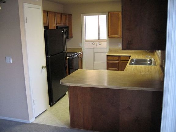 Kitchen with disposal, dishwasher, automatic icemaker