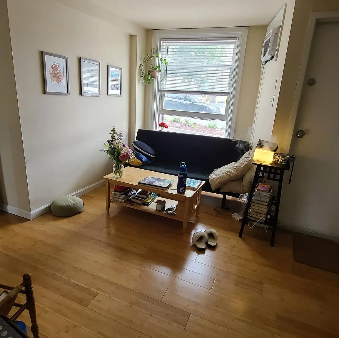 Comfortable living room area with hardwood floors throughout