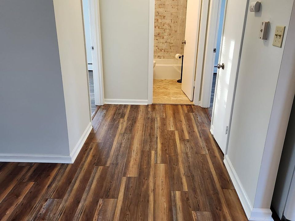 Hall to bedrooms & bath with linen closet.
