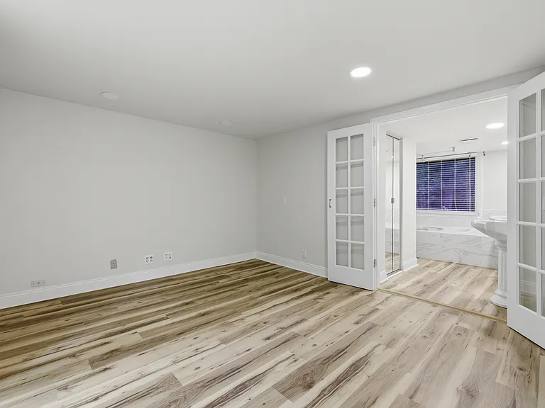 primary bedroom with large walk-in closet