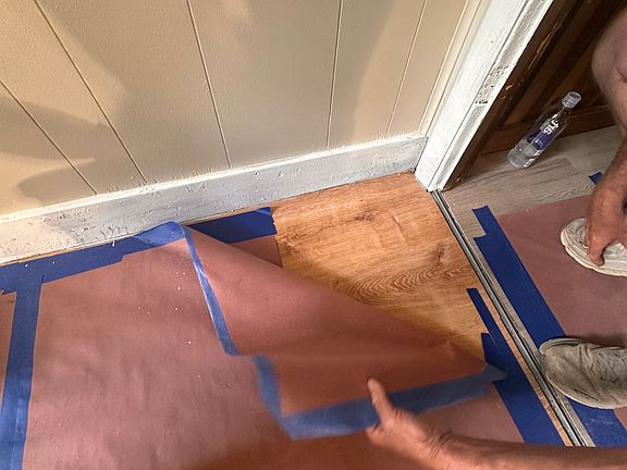 Laundry room, newly painted and new lifeproof laminate flooring.