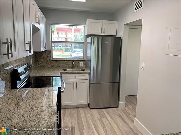 2nd image of 7891 Sunrise Lakes Dr N APT 103