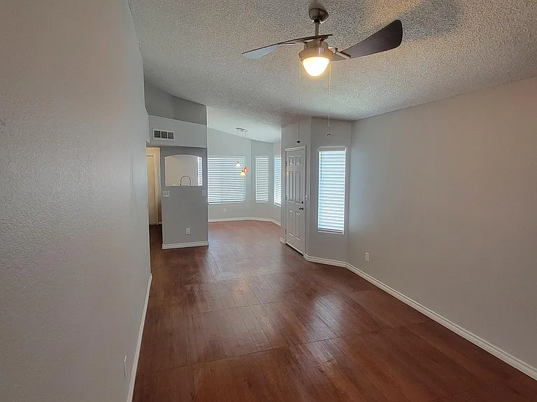 View from living room of front door and dining area.