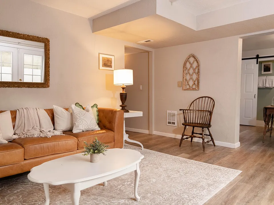Family room, hallway entrance, and kitchen.