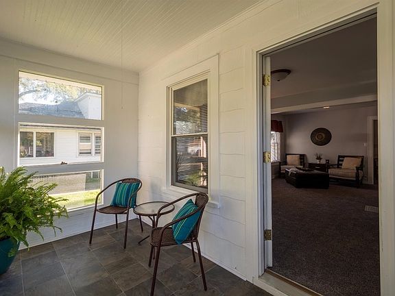 Sun Room/Front Porch. New flooring and freshly painted