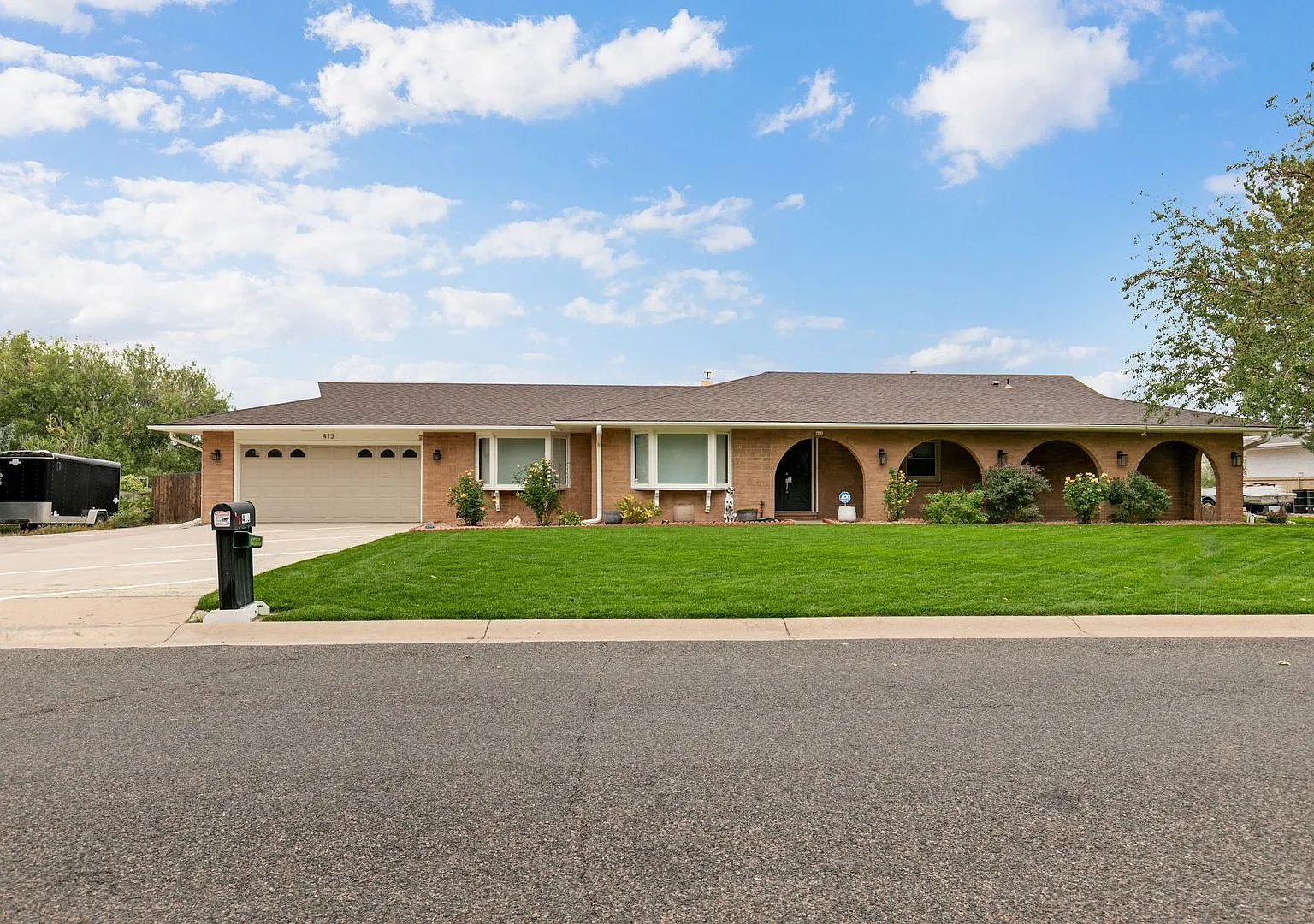4BR Brick Ranch Backing to Open Space | Private Hot Tub | Lawn Care Included — Photo 1