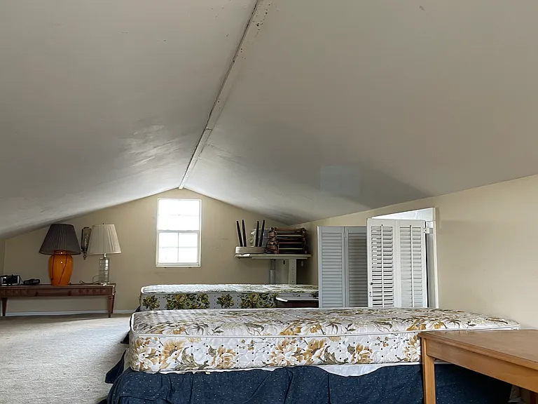 The attic can be used for storage, office, or guest room