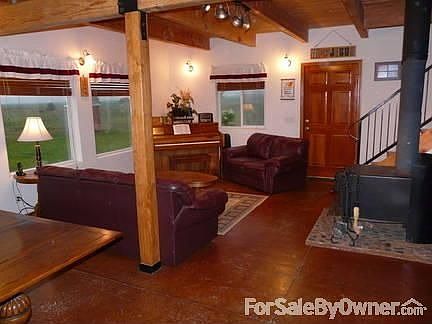 Living rm., Wood Stove, and Stair Case