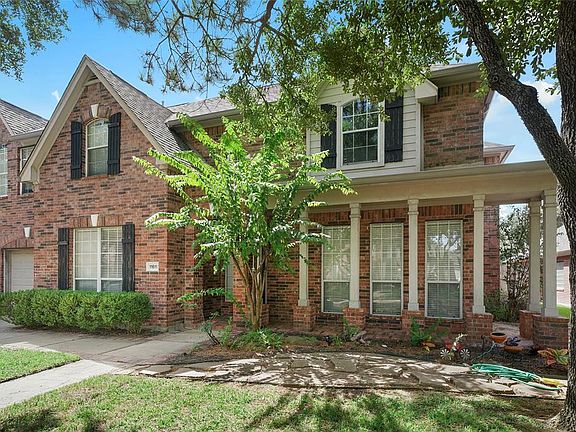brick home with great front porch