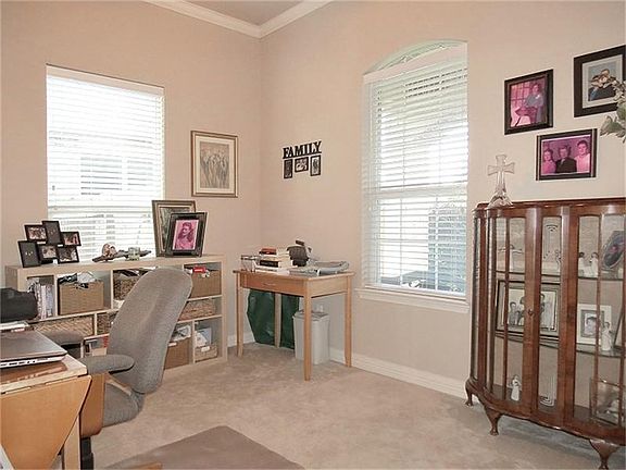 The study is right at the front of the home.