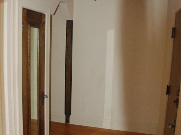 Entry hall with mirrored closet door (original)