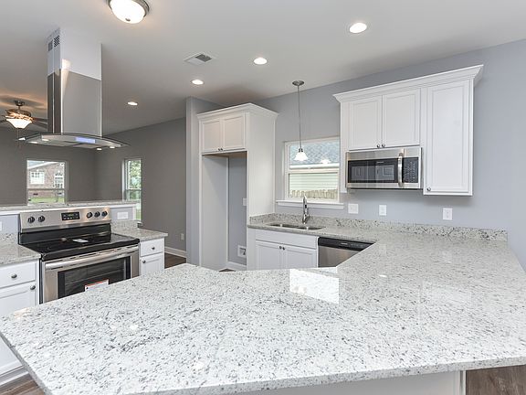Oversized granite countertops (fridge included but not pictured)