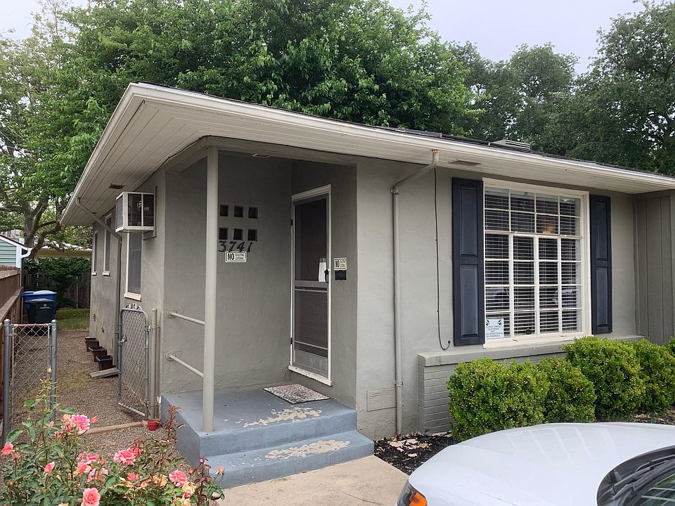 Front side of duplex. Not shown are two parking bays in front driveway (no garage).