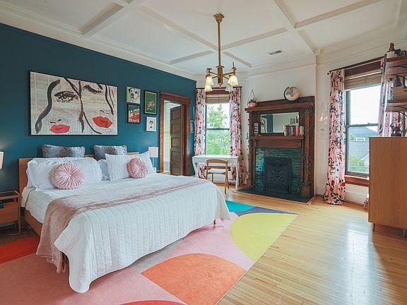 Primary Bedroom 1 has it's own full bath and a desk.
