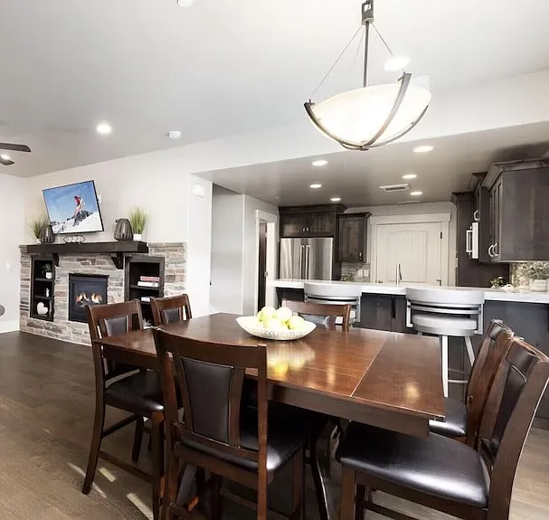 Dining area off open-concept kitchen. Seating for 6. Plus waterfall counter for 2 more.