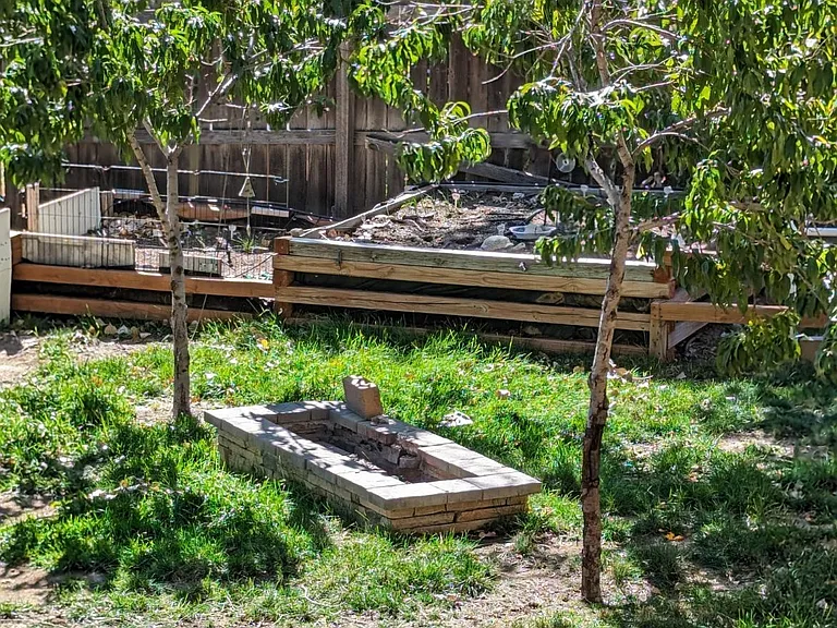 Fire pit and dwarft peach trees
Raised Gardens