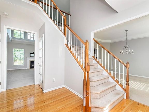 A welcoming entry greets you and is flanked by an den/office on one side and a dining room on the other.