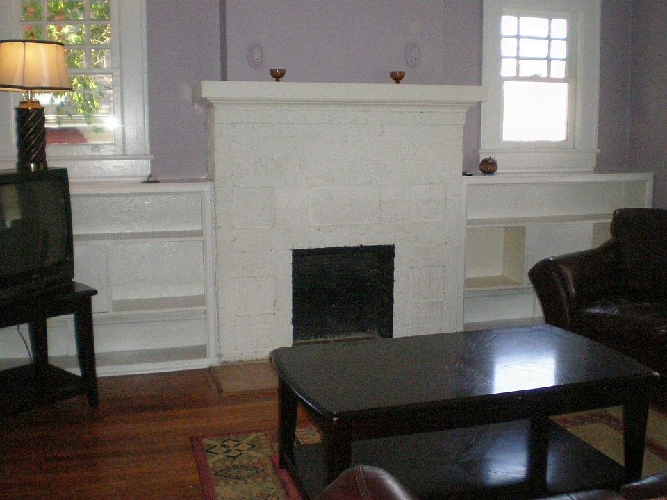 Fabulous FR surrounded by book cases and windows
