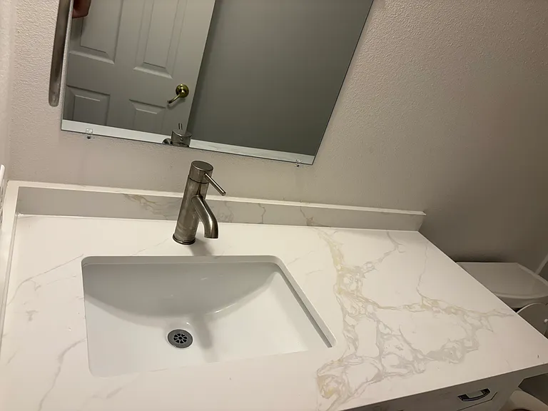 Bathroom No. 3 with new Quartz Counter Top, new faucet and new Ceramic flooring
