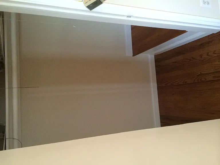 Bedroom 1 closet w/ bench