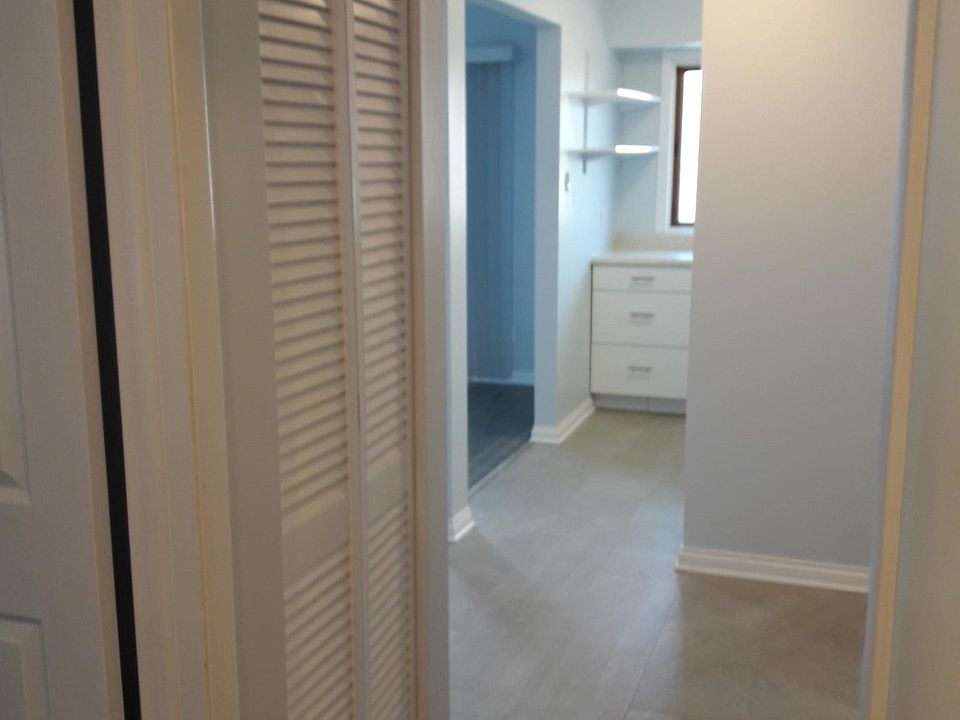 Hallway looking to kitchen