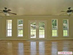 Sunroom with wall of windows