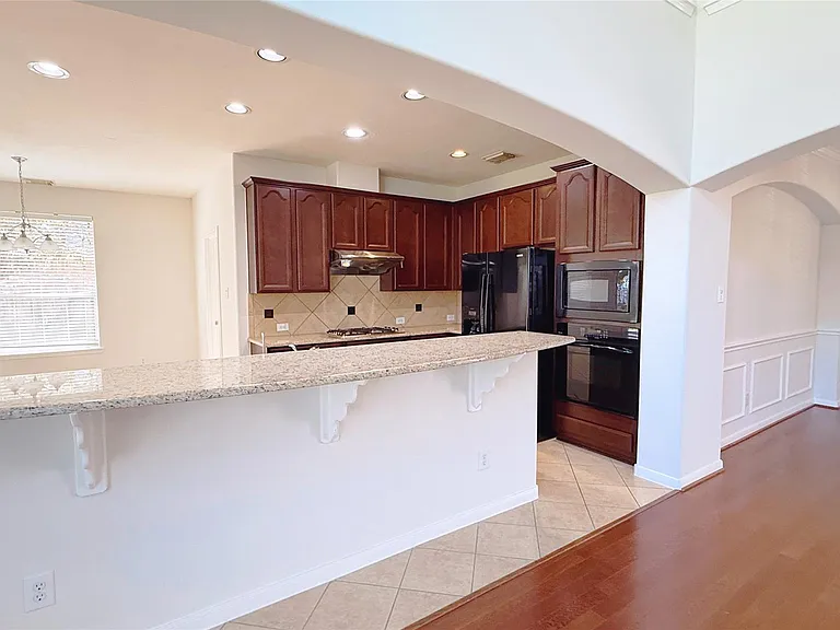 8610 Rising Oak Ln — Photo 24