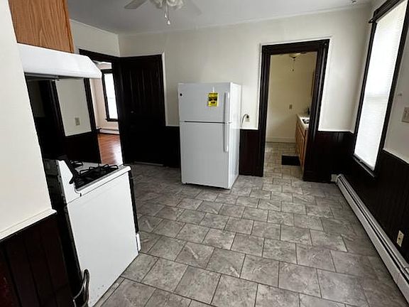 Newer Updated Kitchen with Stove, Refrigerator, GD & Microwave. Pantry with more cabinets