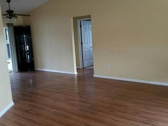 Hallway to guest bath and 2 bedrooms.