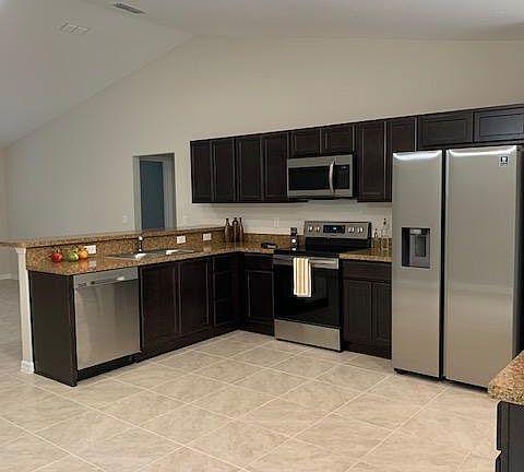 Kitchen with Brand New Stainless Steel Appliances