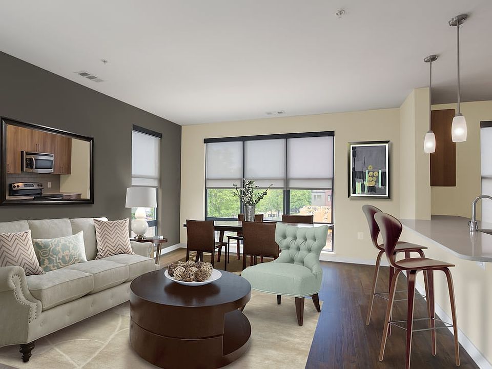 Upgraded living and dining area with hard surface flooring