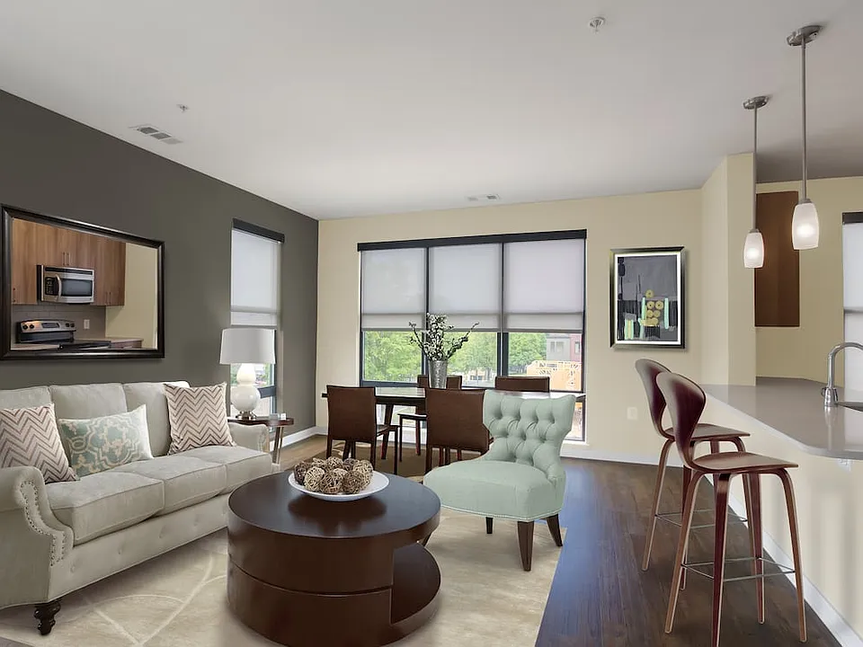 Upgraded living and dining area with hard surface flooring