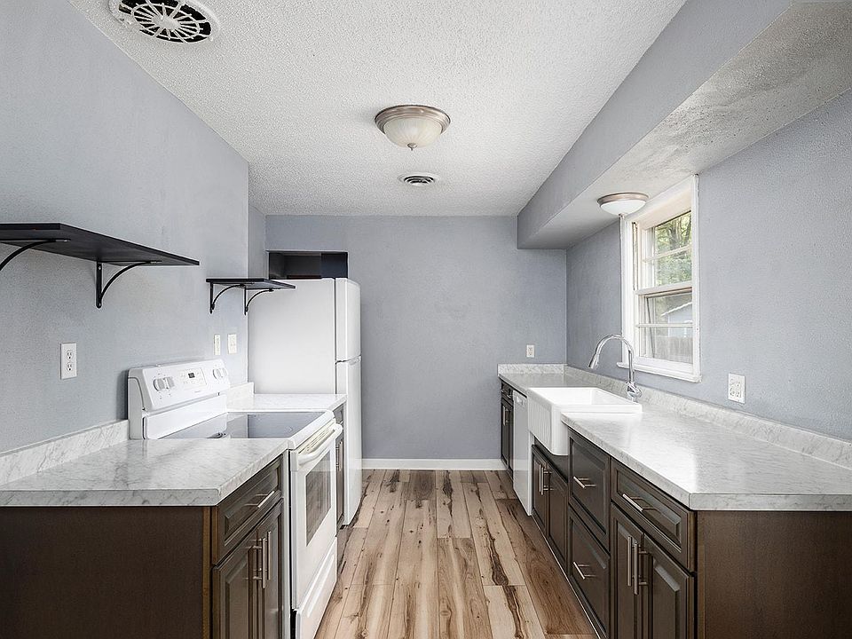 Brand New Kitchen! Soft Close Cabinets, Farmhouse Sink overlooking Backyard