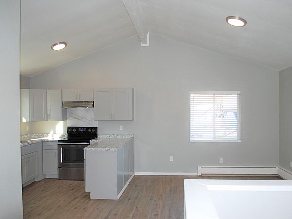 Large kitchen and dining area