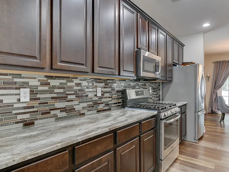 Photos shown are from a nearly identical property/listing and are provided for representative purposes only. Photos do not depict the exact subject property. Actual finishes, condition, layout, features, and details may vary.