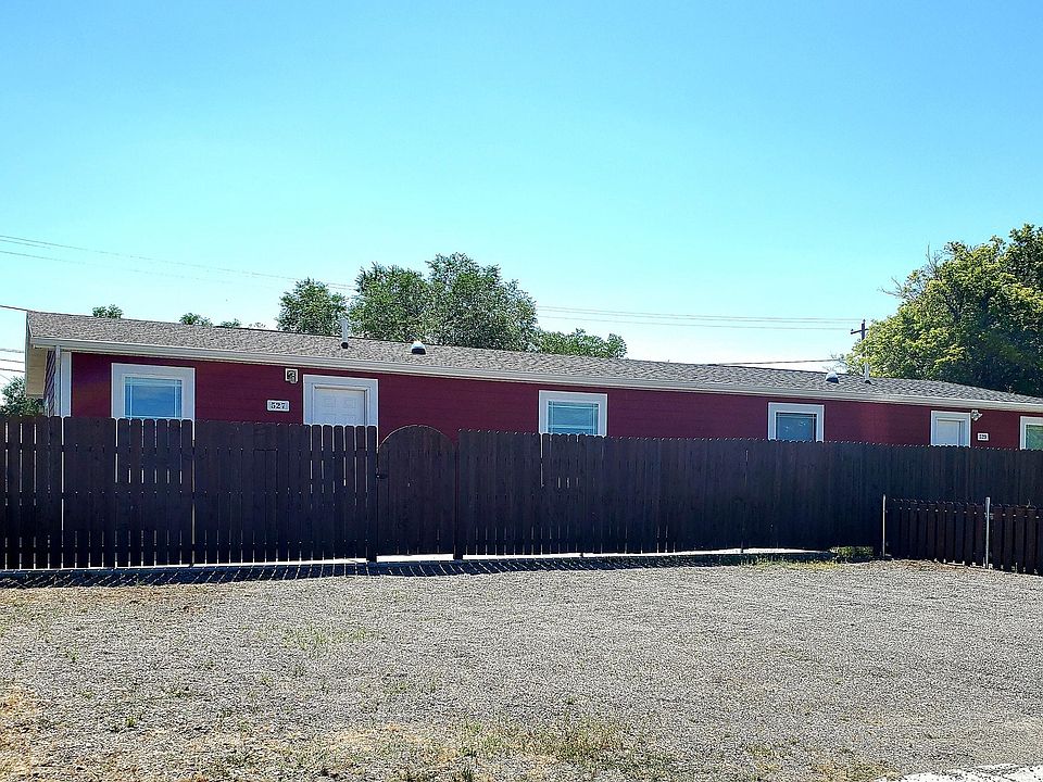 Private, large front patio with large off street parking area.