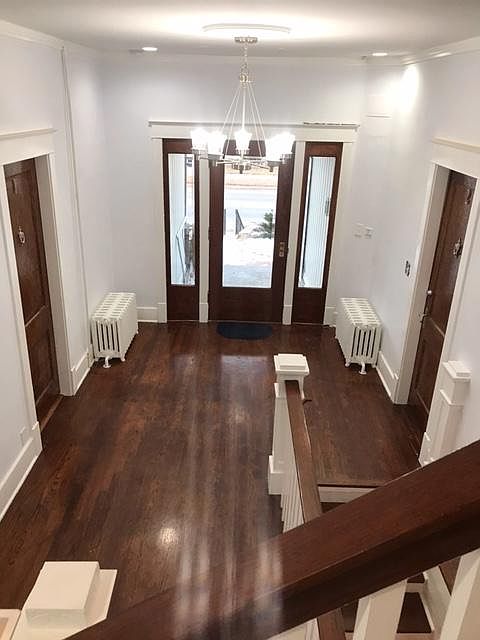Building Main Entry with secured entry system, intercom and security system