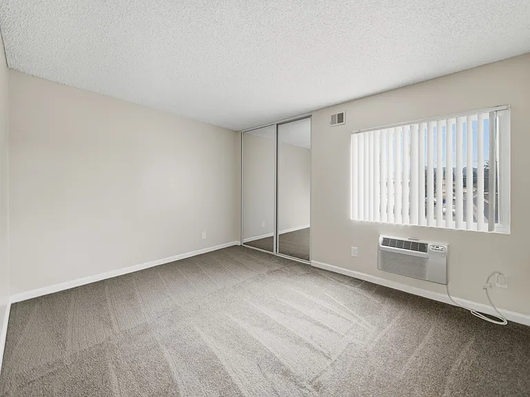 A Guest Bedroom at Midway Gardens Apartments
