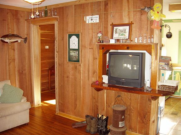 Living room
						:
						side view of living room -door way leads to bathroom & 2 of the 3 bedrooms