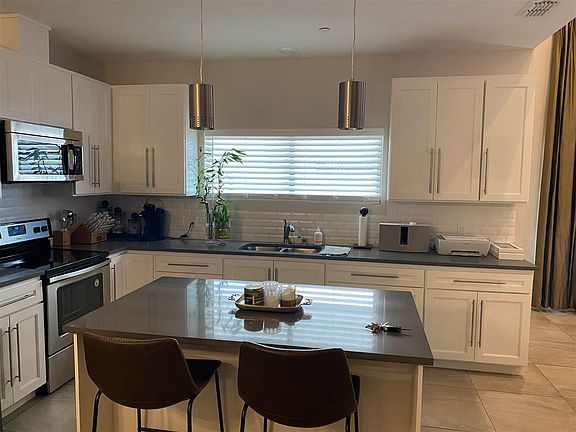 3rd image of 10902 International Blvd #116