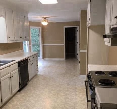 Kitchen. Nice refrigerator has been added.