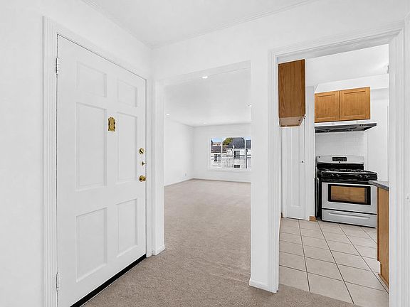 Entrance Facing East Towards Kitchen and Living Room