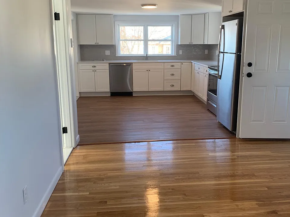 Open concept view from living room to kitchen.