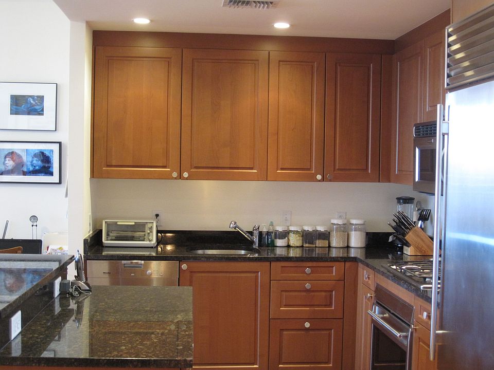 Gourmet Kitchen w/ Cherry Cabinetry and Granite Counter-tops