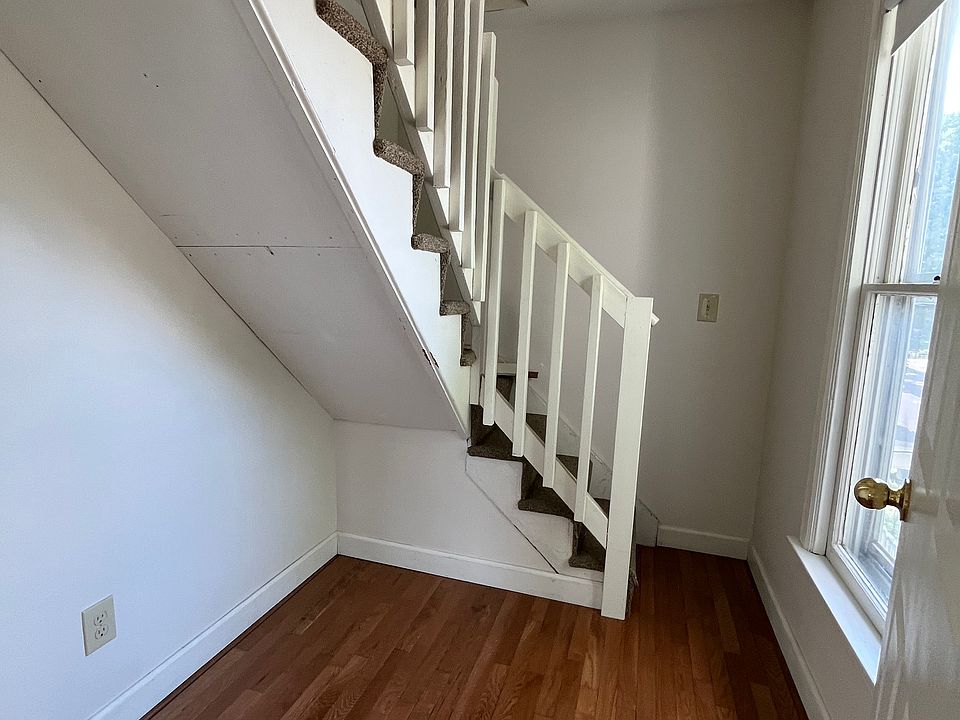Stairs to huge walk-up (unfinished) attic