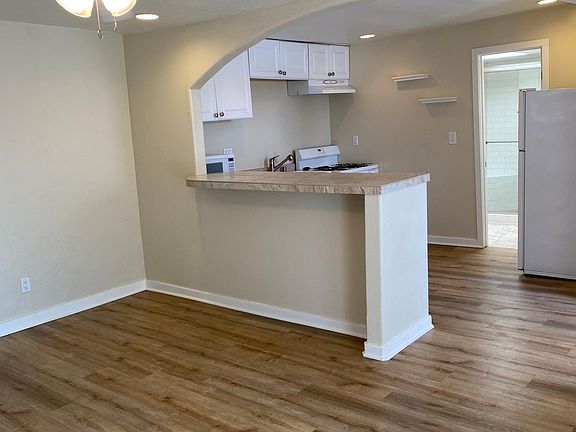 Kitchen opens to Living Room