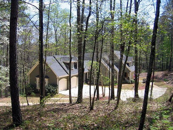 Nestled on private wooded lot