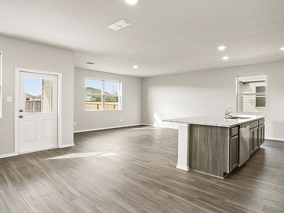 Dining to Kitchen and Family Room