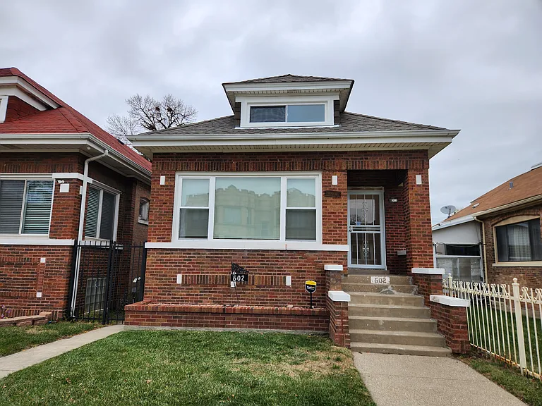 502 E 88th Pl — Photo 1