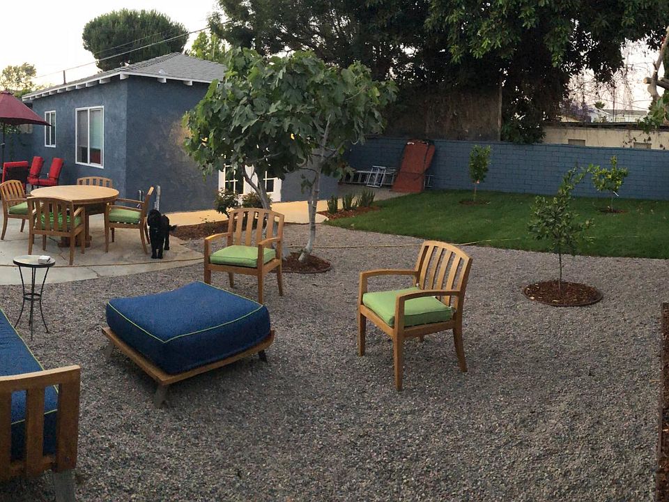 Large backyard with comfy furniture